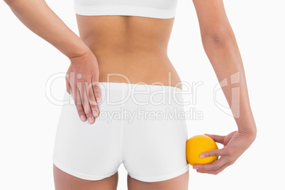 Toned female buttocks with white sport underwear
