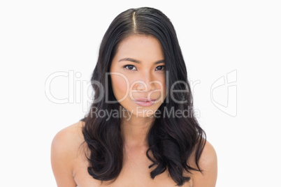 Nude sensual dark haired model posing