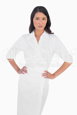 Classy dark haired model with white dress