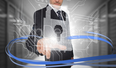 Businessman touching lock on futuristic interface with swirling