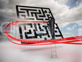 Businessman on ladder tracing red line through qr code