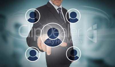 Businessman touching futuristic social network interface