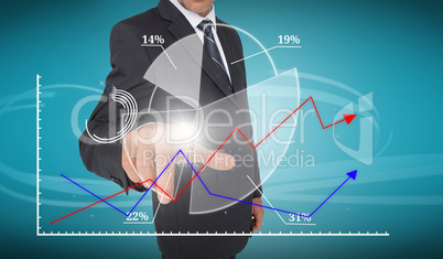 Businessman touching futuristic pie chart interface