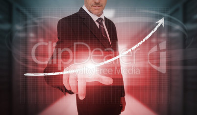 Businessman pressing red growth arrow interface