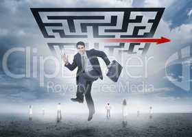 Businessman leaping happily in front of giant qr code