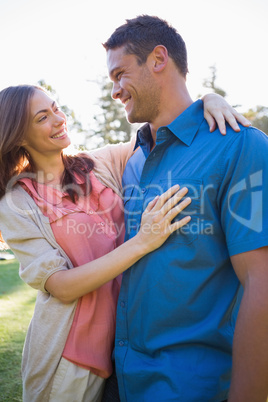 Smiling couple looking at each other in eyes