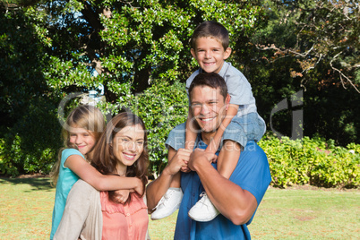 Young family standing together