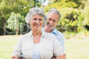 Smiling mature couple in the park