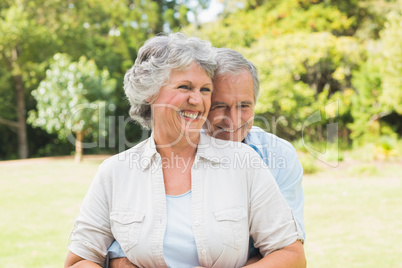 Happy mature couple in the park