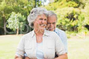 Happy mature couple in the park