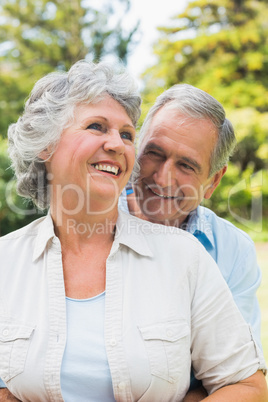 Smiling mature couple in park