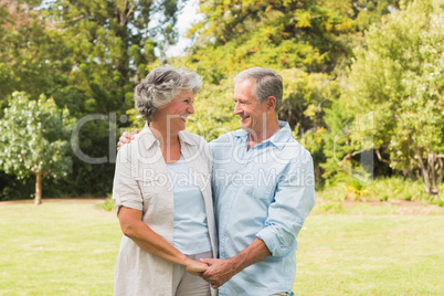 Smiling mature couple in park