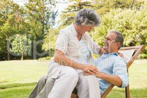 Smiling mature couple in park