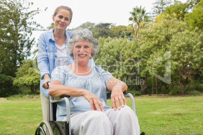 Woman in wheelchair with her daughter