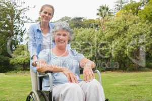 Woman in wheelchair with her daughter