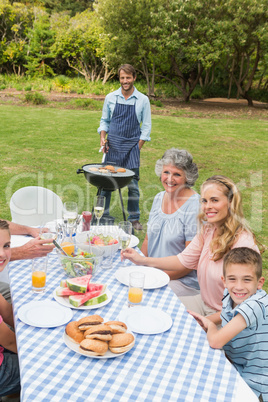 Happy extended family having a barbecue