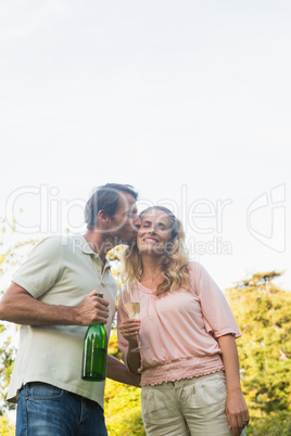 Romantic couple having champagne together