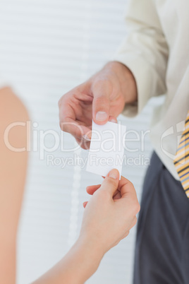 Businessman giving his business card