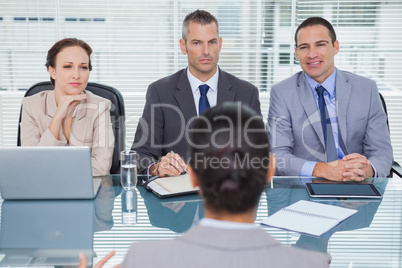 Business team listening to the applicant in interview