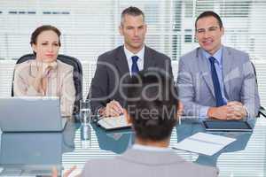 Business team listening to the applicant in interview