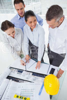 Smiling architect team working together
