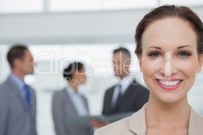 Cheerful businesswoman smiling at camera