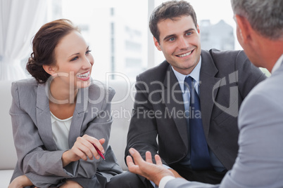 Businessman talking to his partners