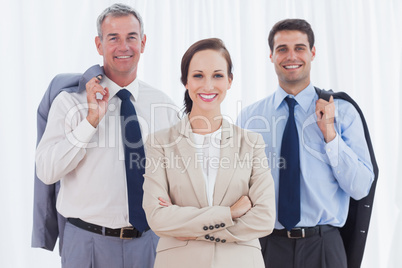 Businesswoman posing with her work team