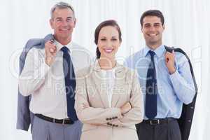 Businesswoman posing with her work team