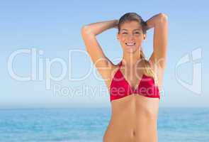 Cheerful attractive blonde posing in bikini