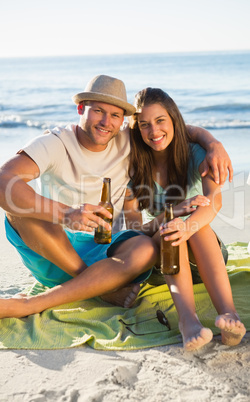 Happy couple drinking together