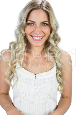 Cheerful blond model smiling at camera