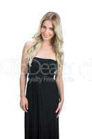 Cheerful attractive blonde with black cocktail dress posing