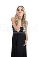 Attractive blonde with black cocktail dress sending a kiss to ca