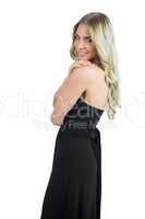 Smiling attractive blonde wearing black dress posing