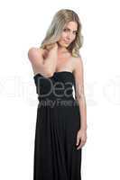 Relaxed attractive blonde wearing black dress posing