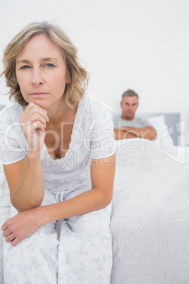 Annoyed woman looking at camera after fight with husband