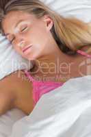 Peaceful blonde sleeping in her bed
