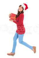 Christmas woman running with gift box