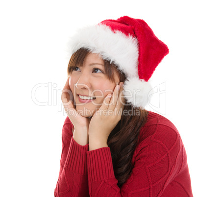 Thoughtful Asian Christmas woman