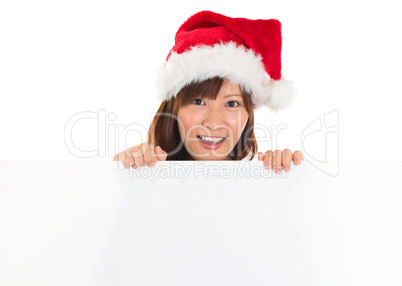 Christmas girl with sign.