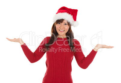 Asian Christmas girl showing empty palms