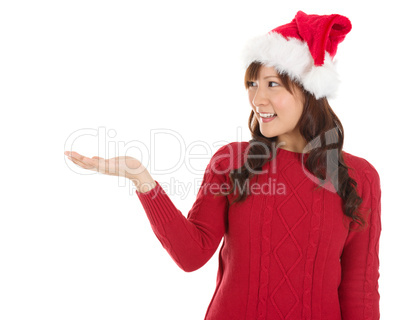 Christmas girl showing empty palm