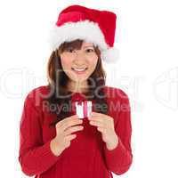 Santa hat Christmas woman holding Christmas gift