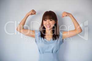 Funny strong muscle Asian woman