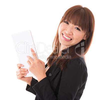 Asian woman using a tablet pc