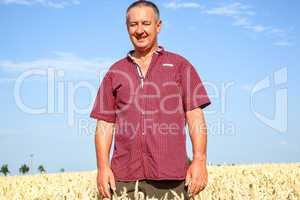 Farmer controls his wheat field