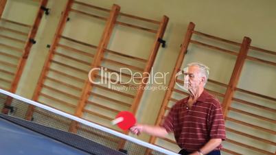 Male - playing table tennis - wide angle