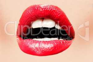 beautiful female with red shiny lips closeup