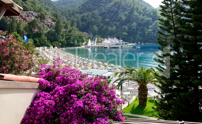 yachts at the pier and beach on mediterranean turkish resort, fe